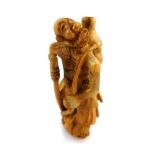 A Japanese ivory netsuke, of the emaciated Immortal Gama Sennin with gourd on his back, unsigned, pr