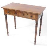 A late Georgian mahogany side table, with two frieze drawers, one lockable, raised on ring turned le