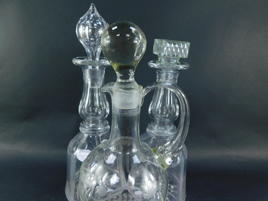 A pair of Victorian cut glass mallet shaped decanters, with one stopper, a further pressed glass mat - Image 3 of 4