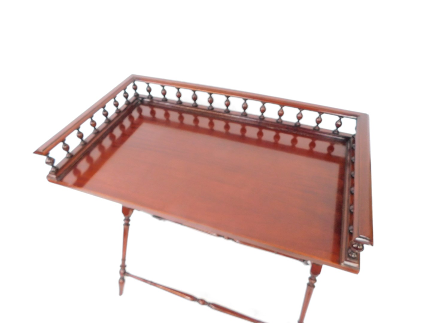 A mahogany butler's tray top table, with a three sided gallery raised on X frame supports, united by - Bild 2 aus 4