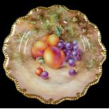 A Royal Worcester porcelain cabinet plate, signed M Johnson, painted with peaches and black grapes,