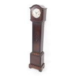 A Kenzle early 20thC oak cased grandmother clock, circular silver dial bearing Arabic numerals, eigh