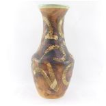 A Raymond Everett of Rye pottery vase, c1960's, decorated with stylised figural motifs against a bro