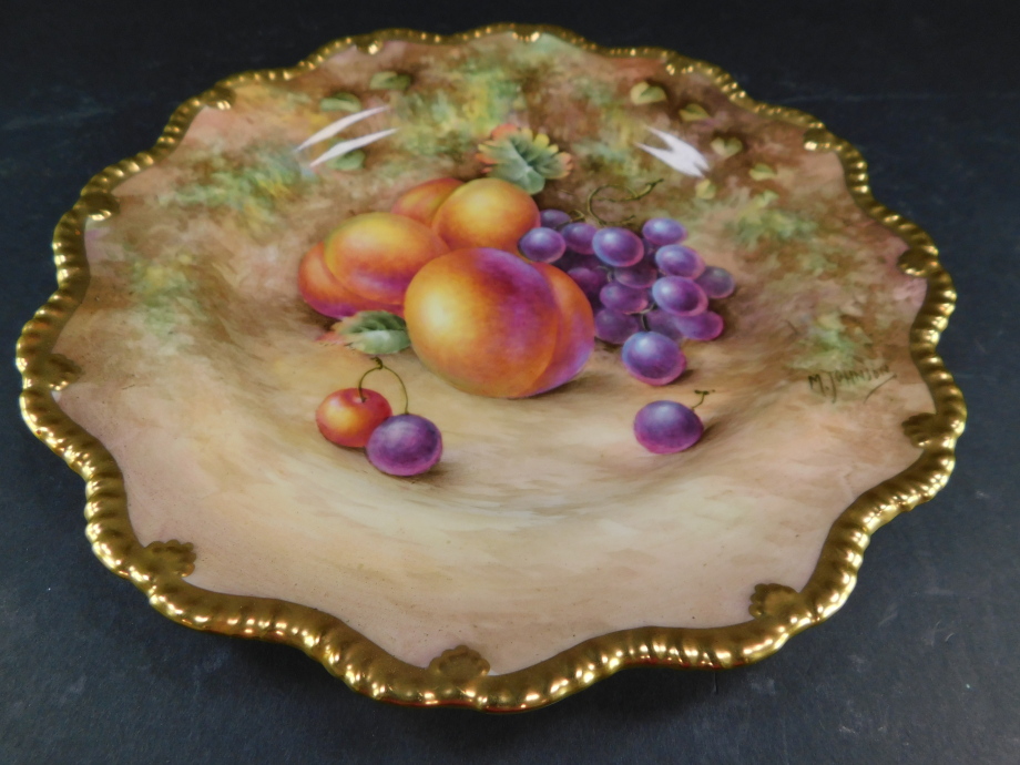 A Royal Worcester porcelain cabinet plate, signed M Johnson, painted with peaches and black grapes, - Bild 2 aus 3