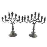 A pair of Judaica weighted pewter Menorah, 46cm high, 39cm wide.