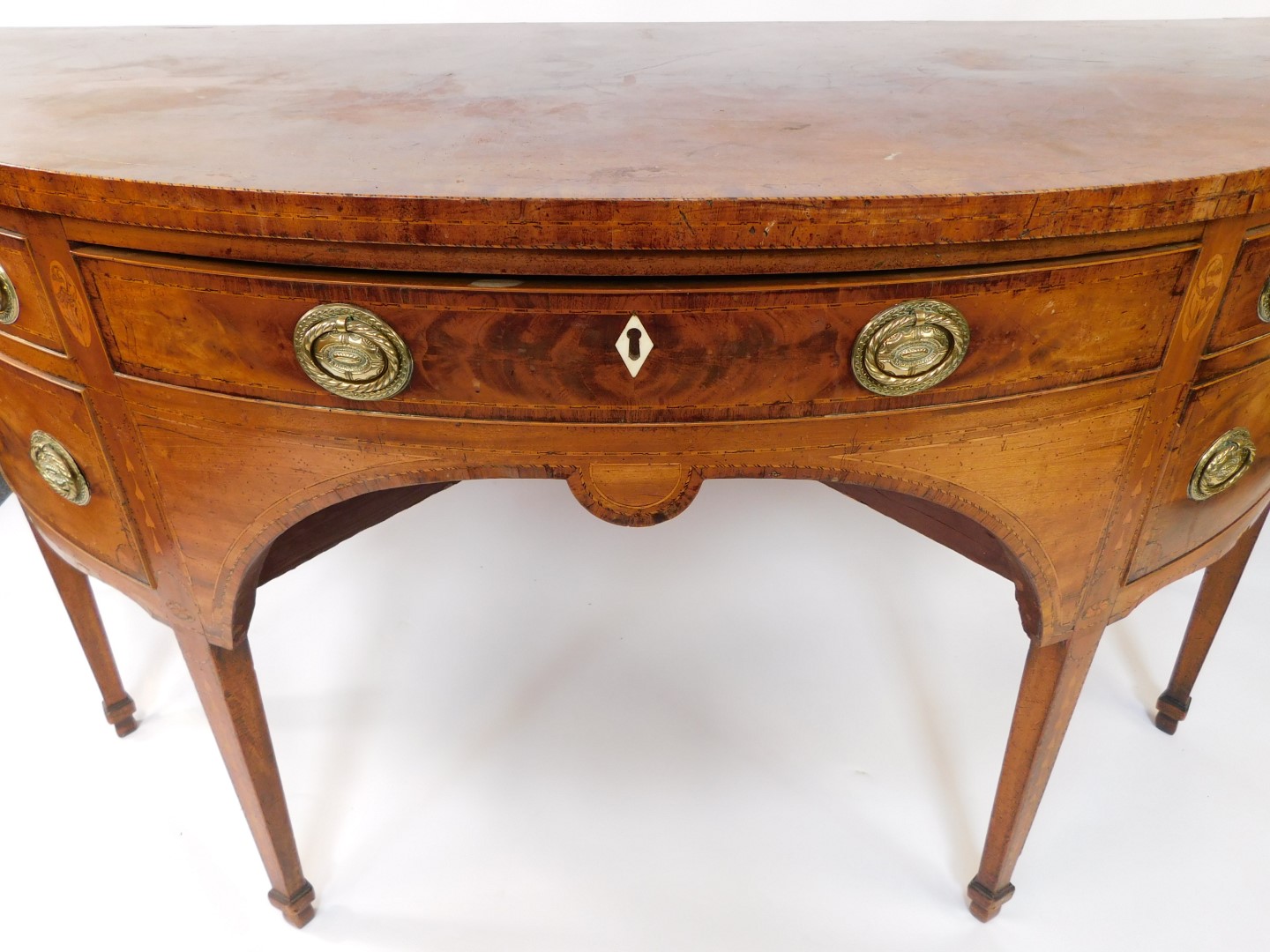 A George III mahogany demi lune sideboard, with cross banded and line inlaid top, an arrangement of - Image 6 of 11