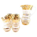 A 1950's cut glass and gold resist water set, decorated with a band of flowers and leaves, comprisin