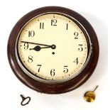 An early 20thC oak cased wall clock, circular dial bearing Arabic numerals, with key, 39.5cm diamete