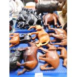 Treen carved African animals, to include rhinos, elephants, etc. (2 trays)