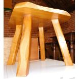 A rustic elm occasional table, 41cm high, 44cm wide, 46cm deep.