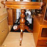 A reproduction fold over games table, with single drawer, raised on a tripod base, 78cm high, 78cm