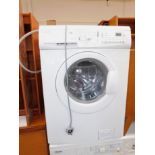 A John Lewis washing machine, model JLW1M1203.