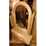 A pine dressing table mirror, 70cm high, 54cm wide, 18cm deep.