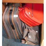 An Antler suitcase, holdall and a red leatherette case.