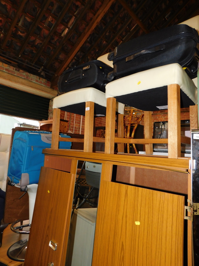 A pair of oak and cream leather dining chairs, together with a bar stool and three suitcases. (6)