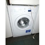 An Indesit 1200 spin 6kg washing machine, model WIXE127.