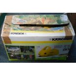 A Karcher Power 100 232+ pressure washer, boxed.