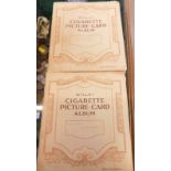 Two Wills's cigarette picture card albums, for Garden Flowers and Speed.