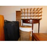 A mahogany demi lune side table, 74cm high, pine eighteen division wine rack, CD rack, washing