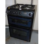 A Hotpoint oven, with gas four ring hob and two electric ovens, model HAG 60K.