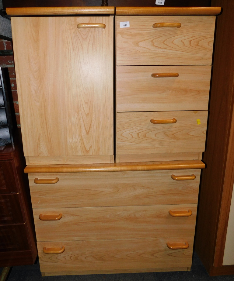 An elm effect chest of three drawers, 66cm high, 81cm wide, 54cm deep., together with two bedside