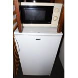 An LEC under counter fridge, model L5026W, together with a microwave. (2)