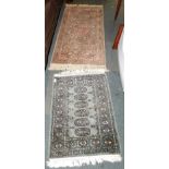 A Keshan Super runner, salmon ground, with central flower head medallion and floral borders, 149cm x