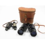 Two pairs of binoculars, to include a pair of Imperial 8x lens binoculars numbered 19386, and a case