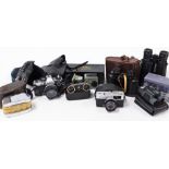 A group of cameras and binoculars, to include an Opticron car window mount, a pair of USSR opera gla