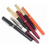 A group of Parker and other fountain pens, to include two Parker fountain pens with gold coloured to