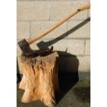 A log splitting axe and an Elwell stamped hatchet, on block stump.