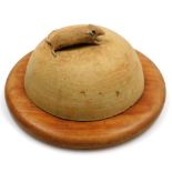 A Studio pottery cheese dome, the dome with applied mouse top, on a turned walnut base, the lid unma