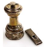 A silver pepper mill by Mappin & Webb, Birmingham assay and a silver cigar cutter. (2)