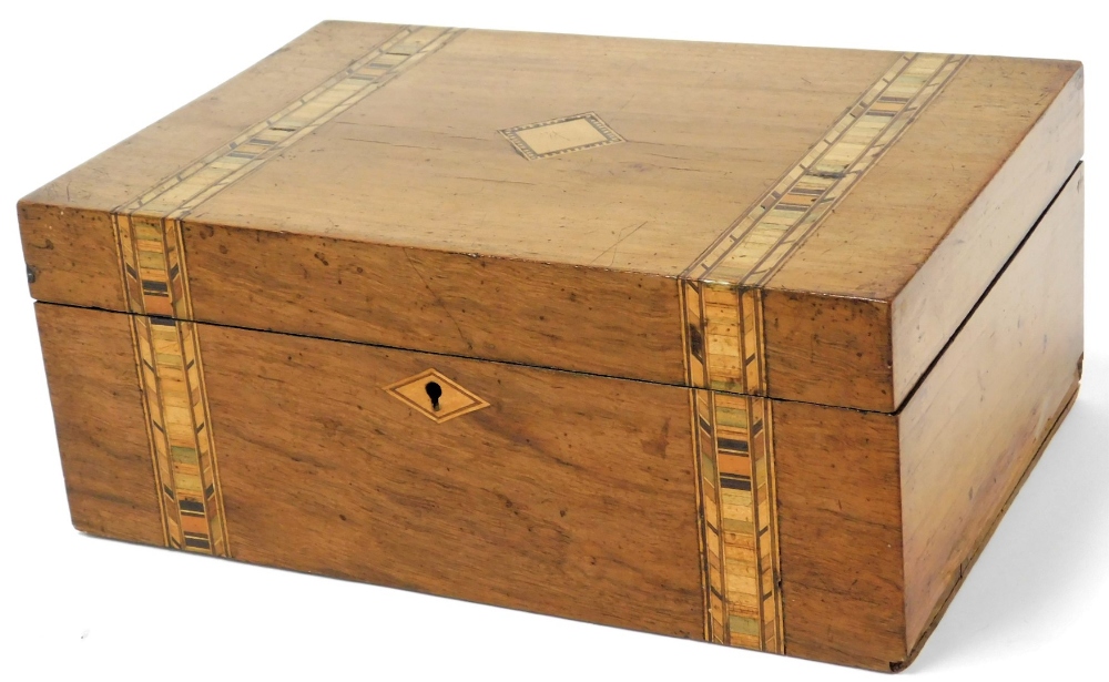 A late 19thC walnut writing box, with parquetry ribboned banding and central parquetry diamond, with