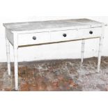 A Regency painted and simulated bamboo side table, with three frieze drawers having knob handles, 77