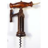 A 19thC Lund Hipkins patent corkscrew, with articulated and pinion operation, with shaped wooden han