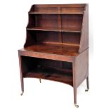 A George III mahogany waterfall library desk, with panel back and under shelf on square taper legs w