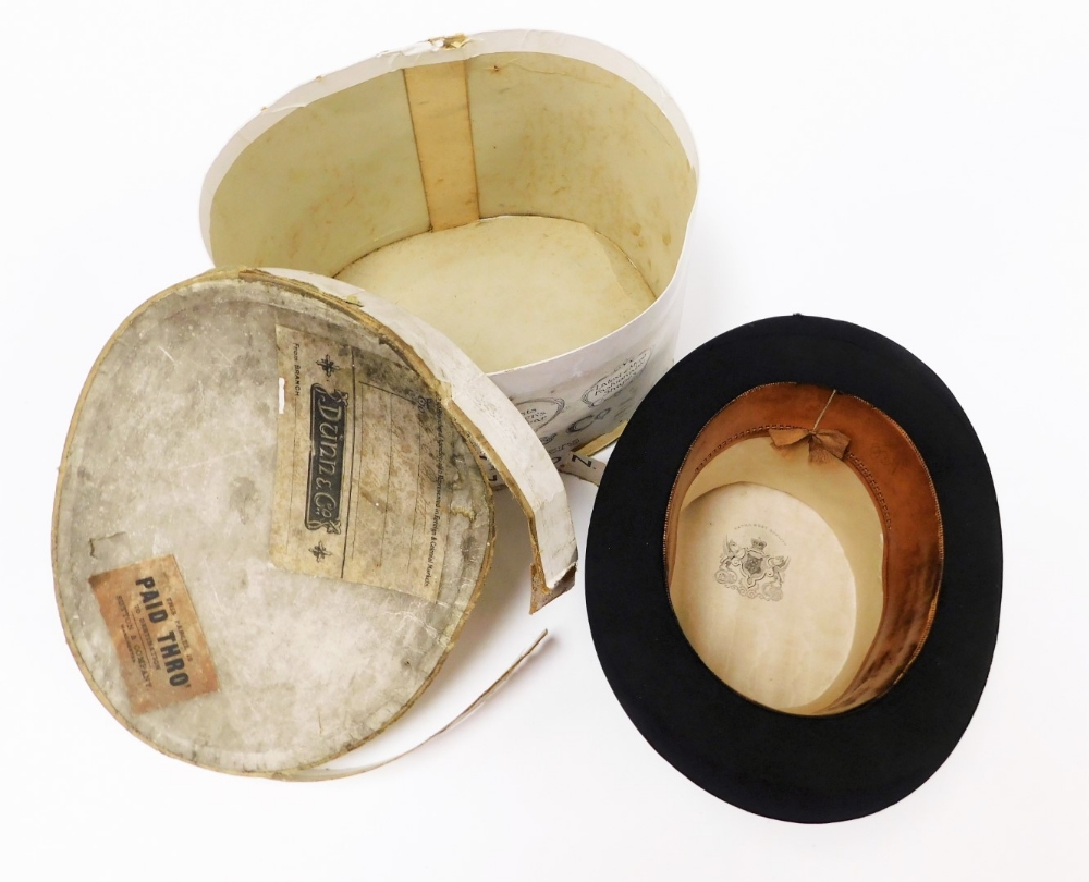 A vintage silk top hat, 15.5cm x 19.5cm, in a Dunn & Co vintage hat box. (AF) - Image 2 of 2