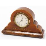 An Edwardian walnut and marquetry inlaid mantel clock, the cream circular dial with Roman numeral nu