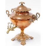 A late 19thC brass and copper samovar, the fluted design top with rococo scrolling and pleated base,
