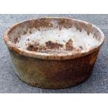 A Victorian cast iron bowl, 42cm diameter.