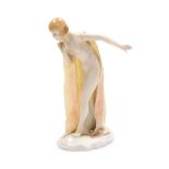 A Diaphan-porzallan porcelain nude figure of a lady, carrying robes, with various stamps to undersid