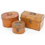 Three late 19thC tin hat boxes, each with a brown painted finish, the smallest 18cm high, 25cm wide,
