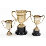 Three silver trophies, to include one for CWS Confectionary Exhibition Blackpool 1959, Birmingham 19