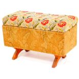A vintage sewing box, on X shaped legs, overstuffed in a petit point floral material, 40cm high, 58c
