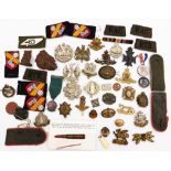 A group of Army badges, cap badges, ribbon bands, etc. (a quantity)