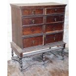 An 18thC oak chest on stand, 121cm high, 96cm wide, 54cm deep. (AF)