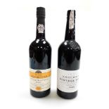 Two bottles of port, to include a Taylor's Vintage Port bottled in 1987 and dated 1985, together wit