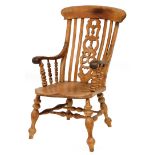 A Victorian ash and elm Grandfather chair, of large proportions, with pierced splat back saddle seat