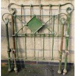 A Victorian cast iron single bedstead.